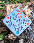 I like pretty things and the word fuck 1.25" ditto tag - Trash Panda's Closet