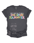 Gray t-shirt with colorful text that reads, "Don't mind me, I've got a DOG SPORT hangover".