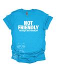 A bright blue t-shirt with the text "NOT FRIENDLY the dog is also sketchy af" printed in white.