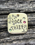 Sock thief 1" ditto tag - Trash Panda's Closet